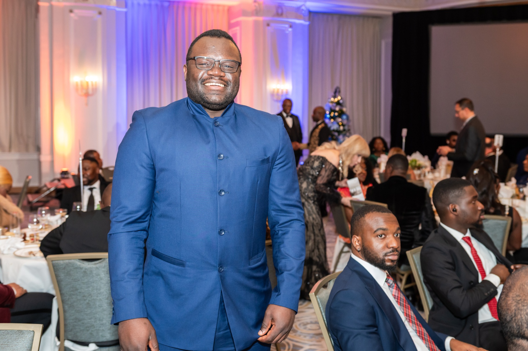 Guest in blue formal wear during the gala dinner