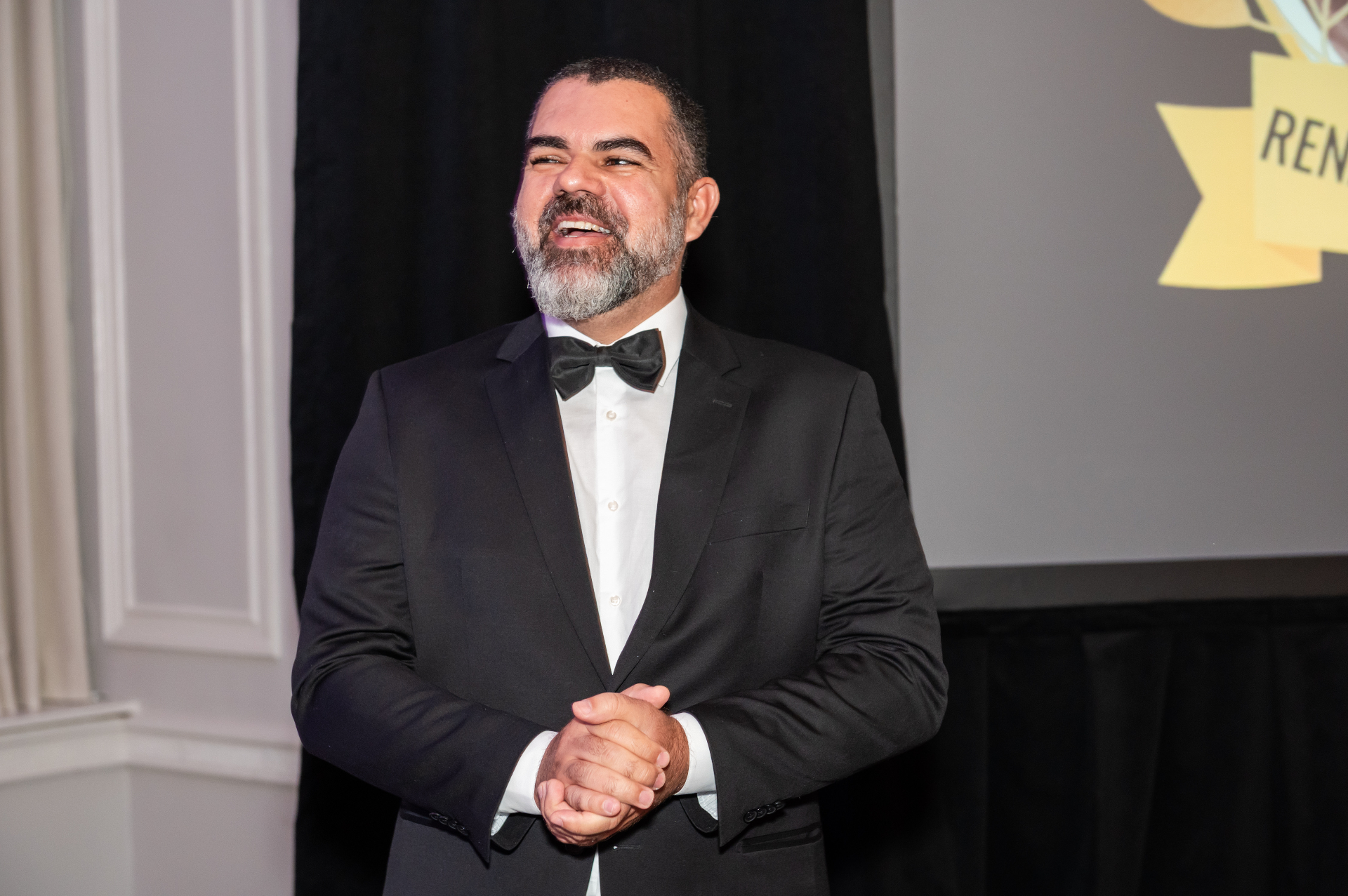 Elias Almeida on stage at the MBOMBO Gala Night 2025 award presentation