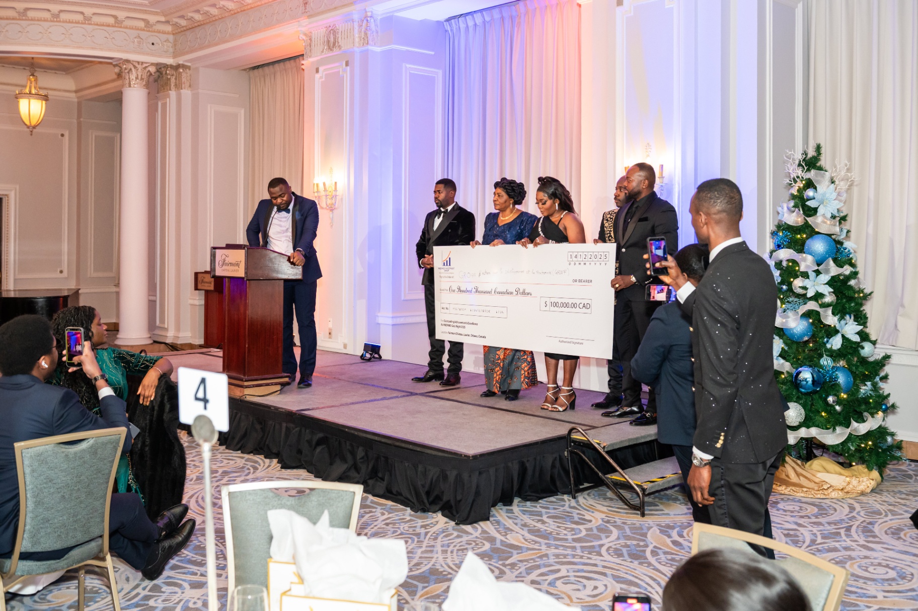 Grand Prize recognition moment viewed from the audience floor