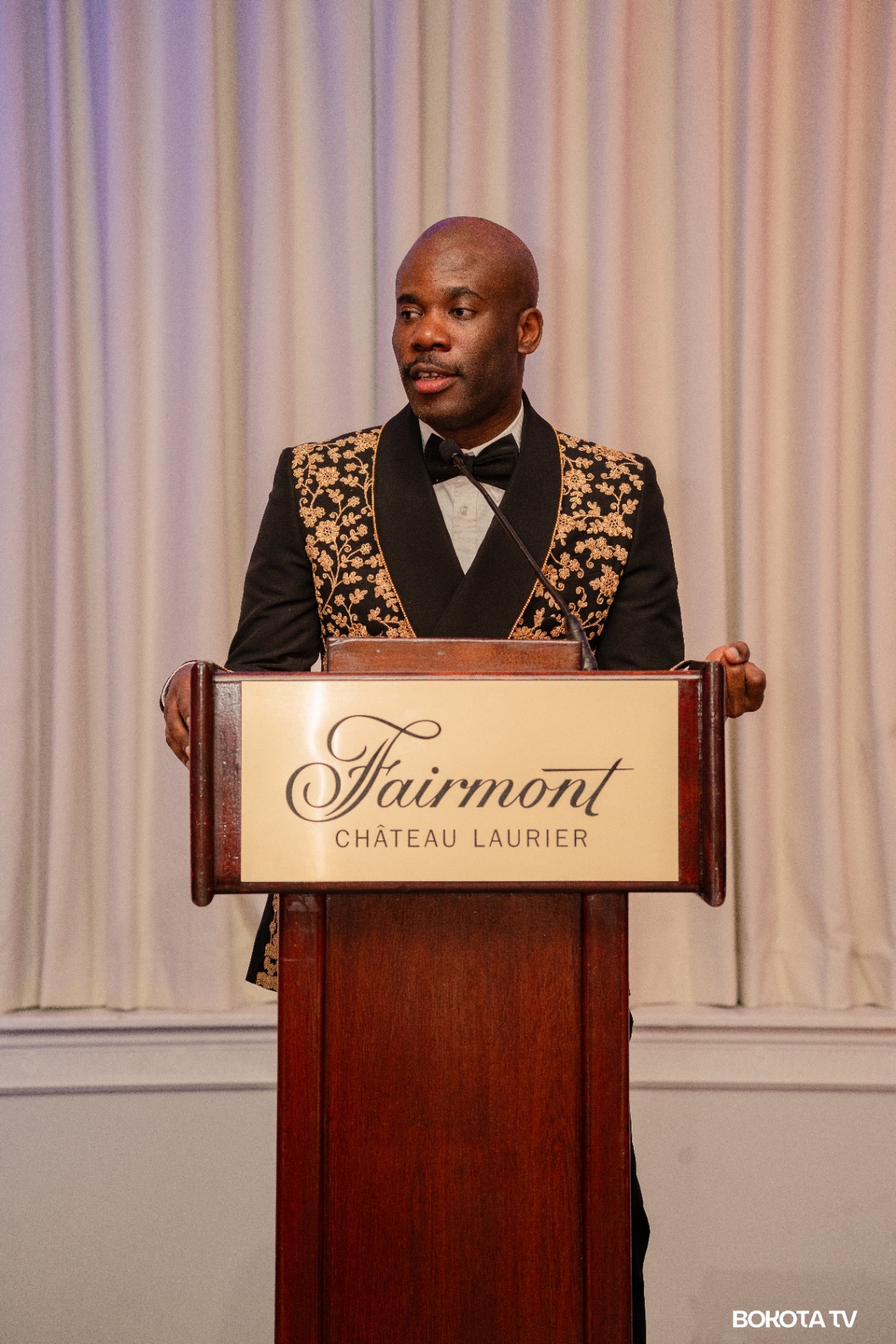 2025 Mbombo Gala Night at the Fairmont Château Laurier — guest in embroidered tuxedo, hosted by Mbombo Investment Group