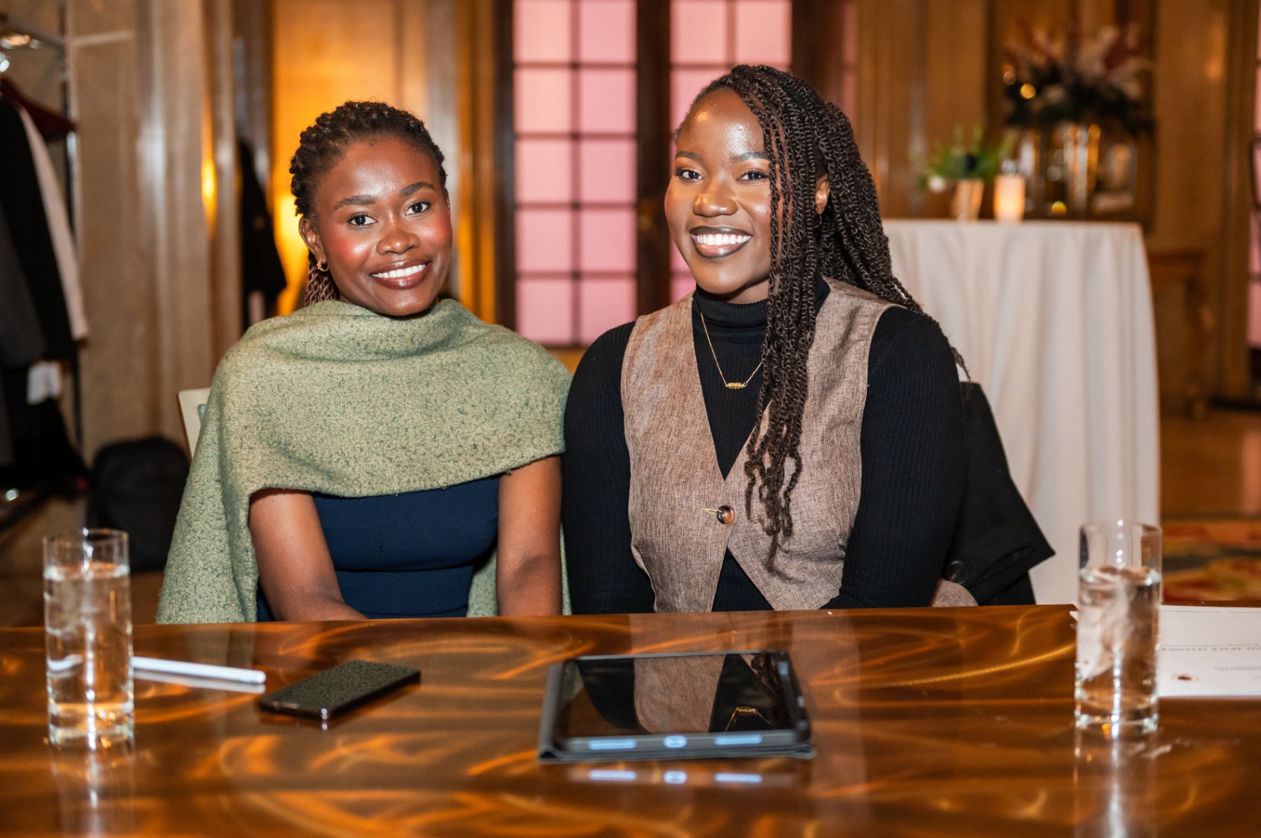 Two attendees posing during the Mbombo Gala Night reception
