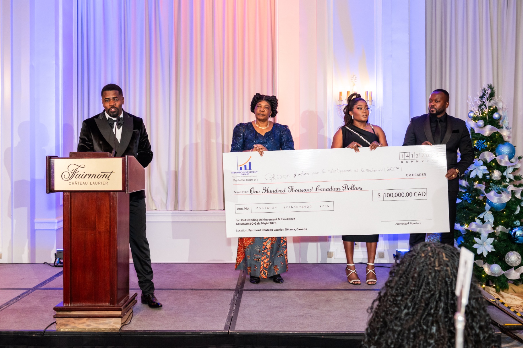 Grand Prize cheque presentation — One Hundred Thousand Canadian Dollars at the Fairmont Château Laurier