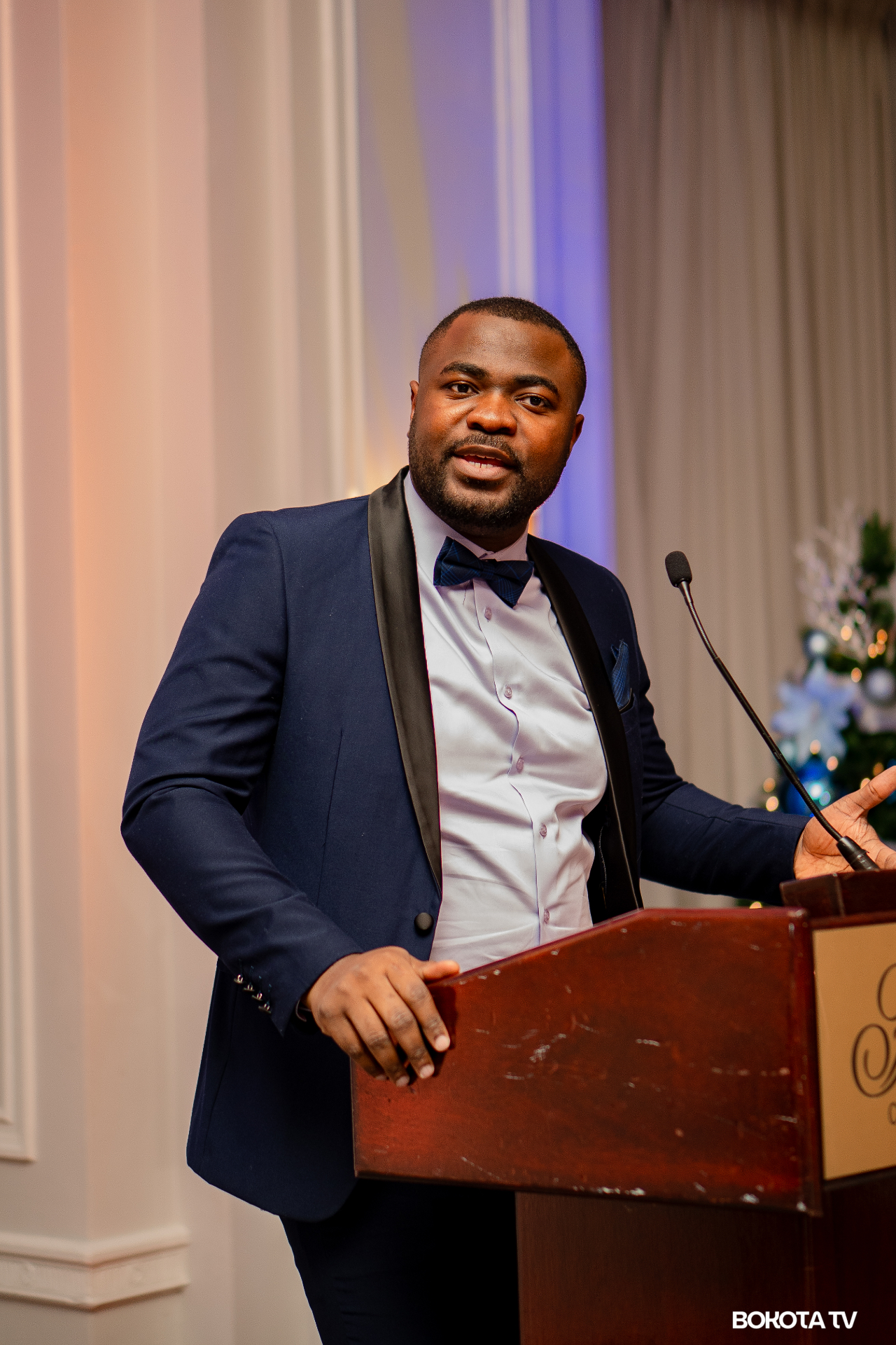 2025 Mbombo Gala Night at the Fairmont Château Laurier — delegate in navy tuxedo, hosted by Mbombo Investment Group