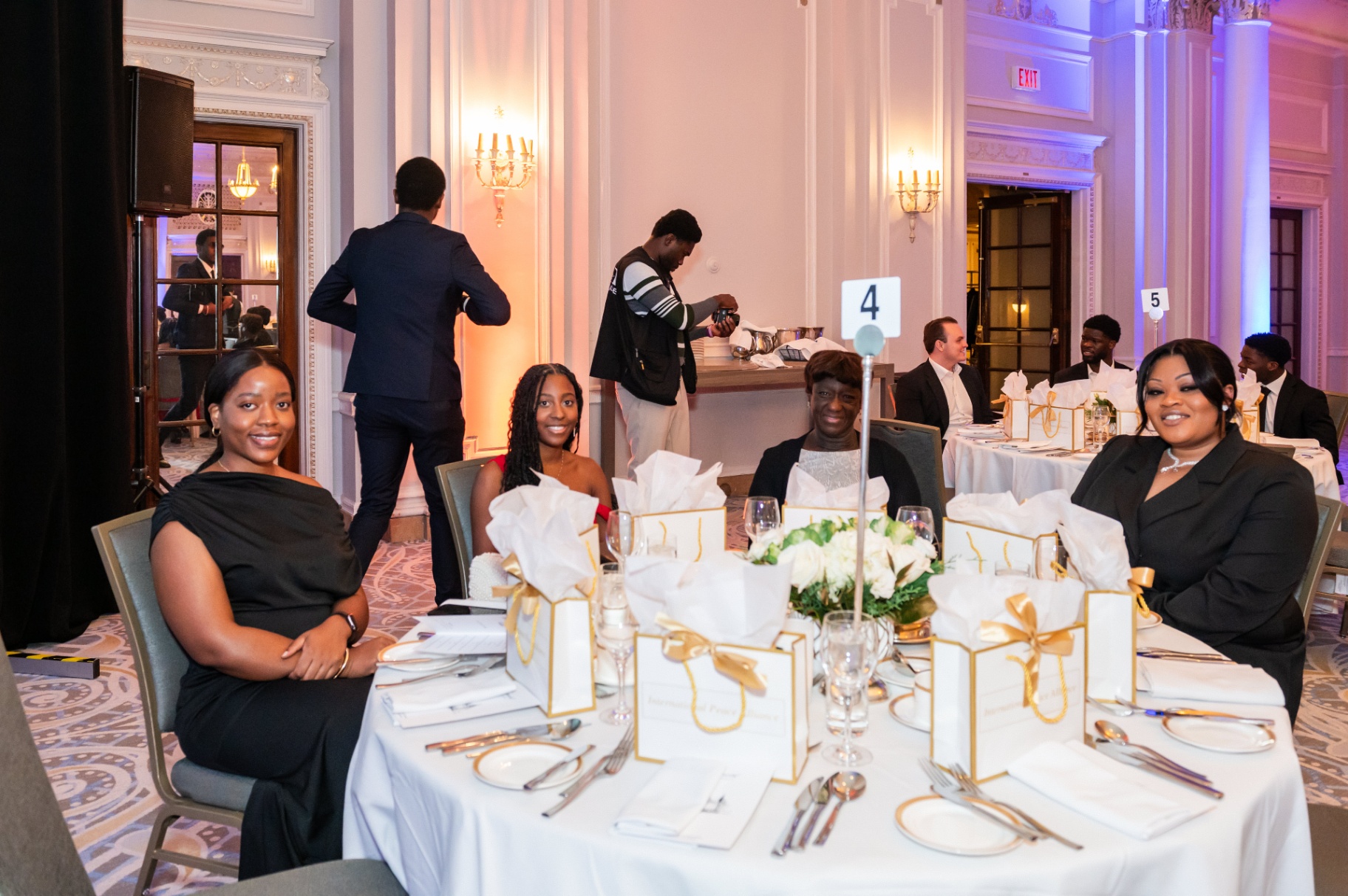 Guests seated at table four during the gala dinner service